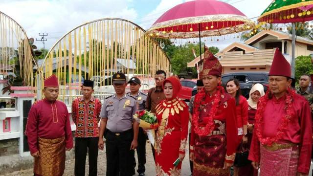 Iskandar Kamaru Dijemput dengan Adat Mongondow, Herson Mayulu Dianugerahi Gelar “Ki Kolano Nonombonu Bo Nolintak Kon Lipu”