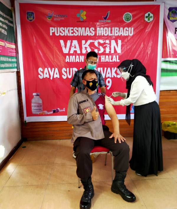 Dukung Program Nasional, Sejumlah Perwira Polres Bolsel Jalani Vaksinasi Tahap Awal