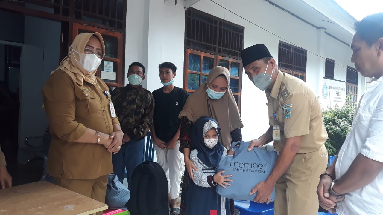 DPPPA Bolmong Salurkan Bantuan Untuk Anak Yatim Terdampak Covid 19