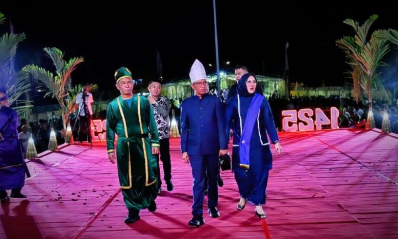 Bupati Boltim Hadiri Pesta Adat Tulude di Sangihe